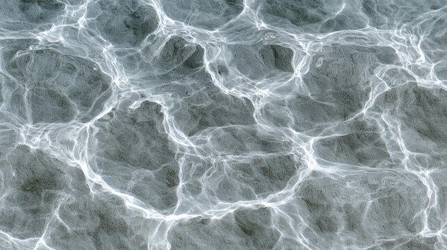 Abstract top view water surface with glowing bright sunlight reflections and ripples
