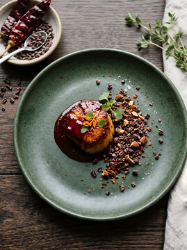 Seared Scallop with Dark Red Guajillo Chili Glaze and Cocoa Nibs