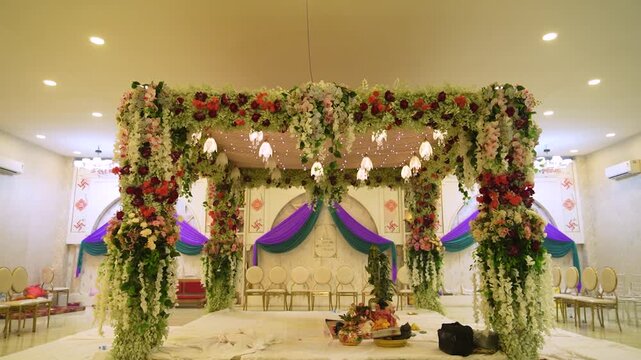 Indian wedding stage decoration. Floral mandap setup for traditional marriage ceremony.