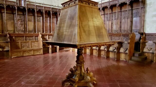 Choir stalls and lectern of the Monastery of Yuste. 16th-century wood-carved choir stalls. Monastery of San Jer&oacute;nimo de Yuste. Spain.