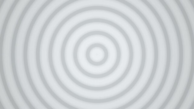 Monochrome concentric circles expand outward in a seamless loop