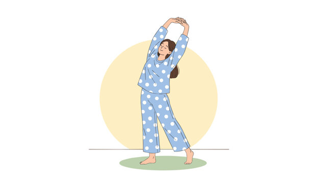 Happy young woman in blue polka dot pajamas stretching her arms up on a green rug with a warm morning sun behind her.
