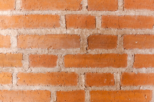 Clean Red Brick Wall Background with Even Rows for Design