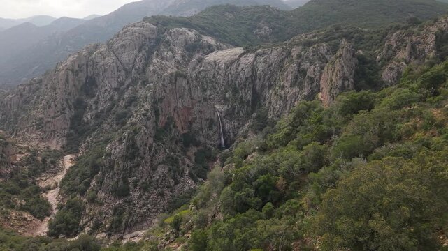 Steep Piscina Irgas Waterfall On the Monte Linas Park In South Sardinia, Italy. Aerial Drone Shot