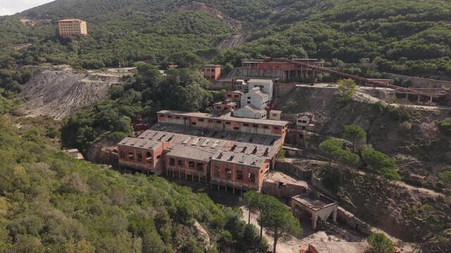 Abandoned Historic Buildings At Montevecchio Mining Complex In Southwestern Sardinia, Italy. Aerial Drone Shot