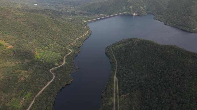 Lago di Montimannu (Lake Leni) Within The Rugged Linas Massif In Southwest Sardinia, Italy. Aerial Tilt-up Shot