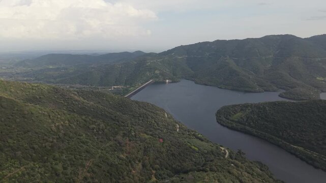 Lake Leni Within The Dense Montimannu Forest In Southwest Sardinia, Italy. Aerial Wide Shot