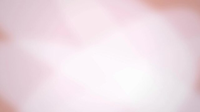 Soft pink and peach light leaks drift in a seamless loop