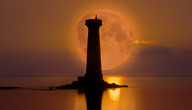 A solitary coastal lighthouse stands tall amidst the calm waters of the ocean during a golden lunar eclipse that illuminates the evening horizon with an amber glow across the tranquil maritime