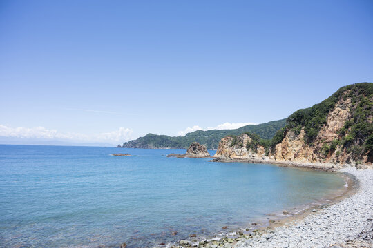 黄金崎の青い海と夏空 静岡県西伊豆町 伊豆半島の絶景、海岸風景 コピースペース