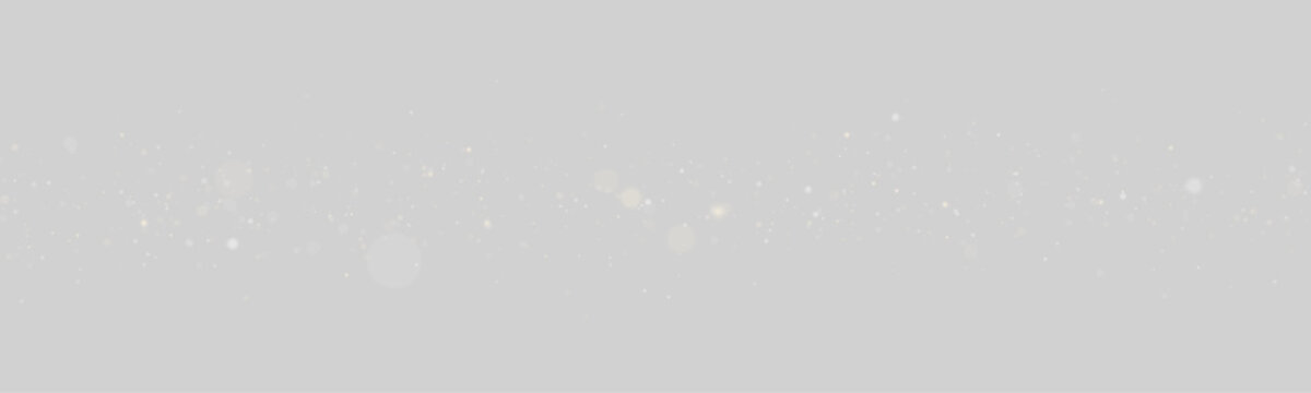Cluster of soft glowing golden sparkles scattered on a black background with various sizes and subtle light effects on transparent background	