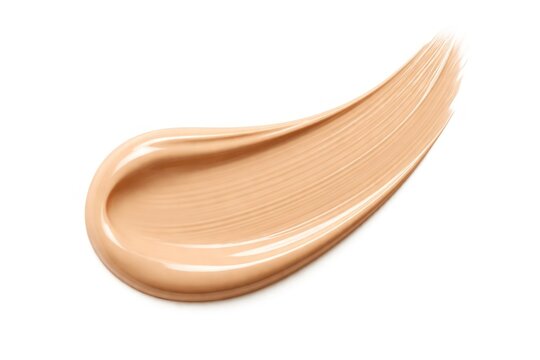 Swatch of nude beige foundation cream with smooth glossy brush stroke on white