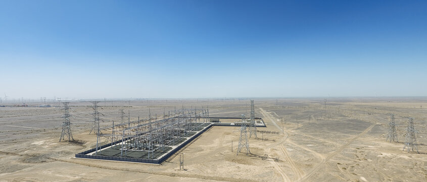 Aerial Panorama of Large Substation and Transmission Towers in Gobi Desert