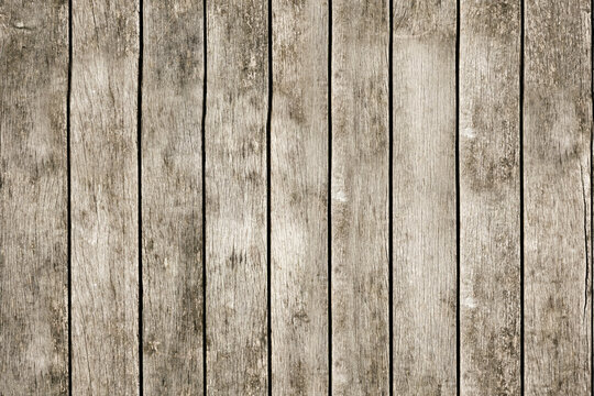 Assi di legno invecchiato con venature, crepe e variazioni cromatiche naturali. Texture rustica e materica, ideale per sfondi, moodboard, design creativo e progetti grafici.