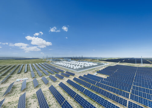 Aerial View of Solar Farm and Energy Storage Power Station in Arid Grassland