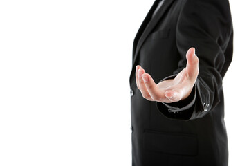 A close-up of a businessperson in a black suit extending an open hand toward the camera, symbolizing an invitation, partnership, support, trust, or a welcoming gesture. © Bogdan