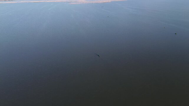 Aerial View of a Small Boat on Lake