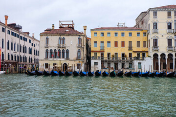 The city of Venice and the view of the Grand  Canal with ferry boat, gondola and water taxi from Rialto bridge  © PaBou