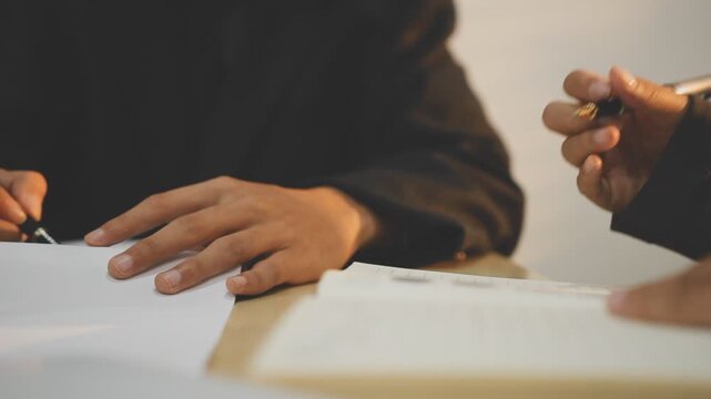 Lawyer explained to the client about the law that must be brought against the court case.