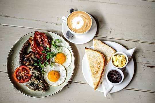 Full English breakfast with coffee and toast