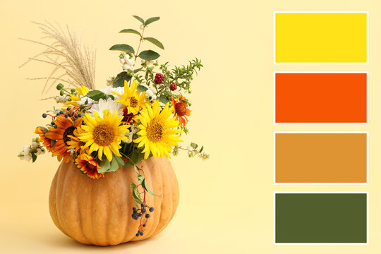 Autumn pumpkin floral arrangement with sunflowers and berries, fall harvest season decoration, seasonal color palette