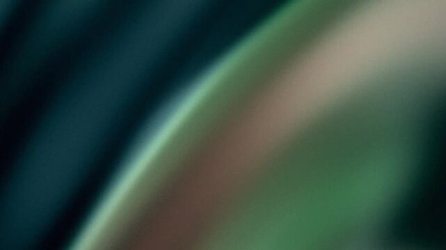 Abstract green gradient background with diagonal light and grainy texture