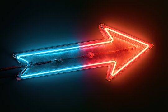 Horizontal arrow sign made of glowing neon tubes split between cool blue and hot red colors on dark black wall backdrop.