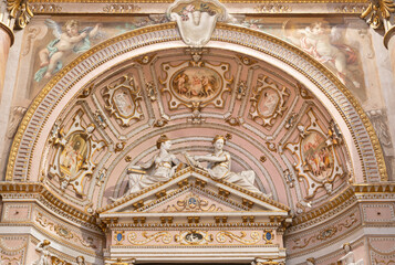 Fototapeta premium CREMA, ITALY - MARCH 20, 2026: The stucco of side altar in the church Santuario di Santa Maria della Croce by Giovan Battista Castello from year (1585)