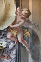 Fototapeta premium CREMA, ITALY - MARCH 20, 2026: The fresco of baroque angel the church Santuario di Santa Maria della Croce by brothers Giuseppe and Giovanni Antonio Torricell from year 1762
