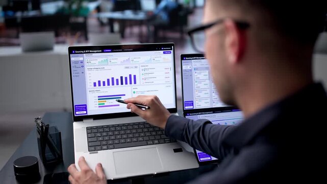 Procurement Manager Uses Dual Touchscreen Laptops For Strategic Sourcing