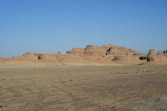 Layered Mudstone Hills in Arid Desert Landscape
