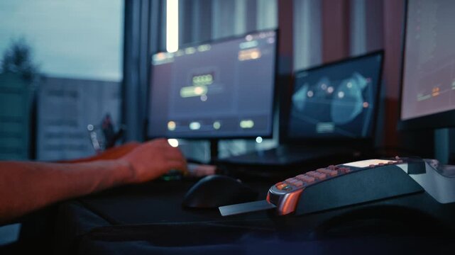 A cinematic technology scene showing a anonymous hacker analyzing a simulated bank card security interface.