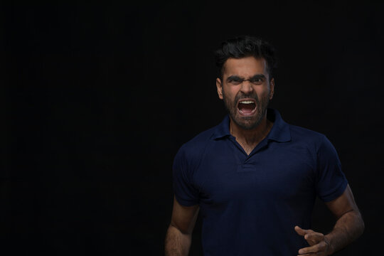 violent young man screaming