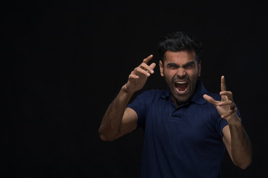 violent young man screaming
