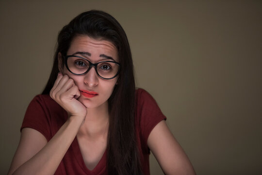 sad girl thinking at home