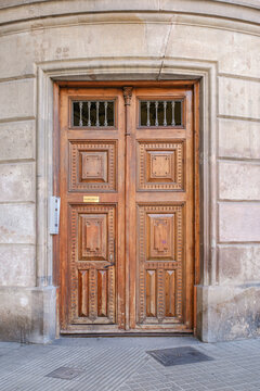 Wooden Entrance Door of Historic Building in Barcelona, Carved Ornamentation, Stone Facade, Classical Architecture