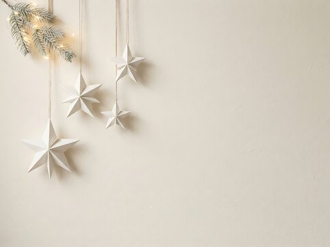 Scandinavian Minimal Christmas Background with Handmade Paper Stars, Pine Branches and Copy Space