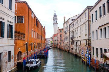 City of Venice, canal, boats, gondola and alley street with colorful buildings and houses  © PaBou