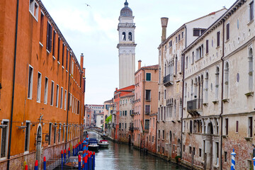 City of Venice, canal, boats, gondola and alley street with colorful buildings and houses  © PaBou