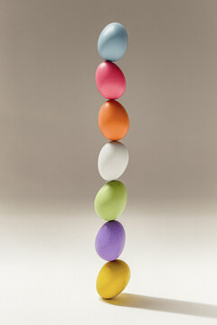 Colorful balancing egg stack for Easter