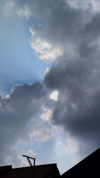 Moving Clouds Covering Sunbeam Sky