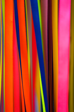 Colorful abstract background with hanging neon ribbon