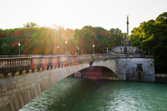Germany, Upper Bavaria, Munich, Luitpoldbrucke crossing Isar river with Angel of Peace in background