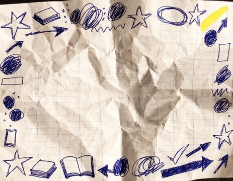 A crumpled graph paper with blue ink hand drawn doodles border