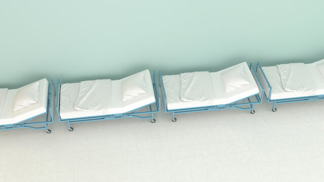 A row of empty hospital beds stands inside a medical clinic