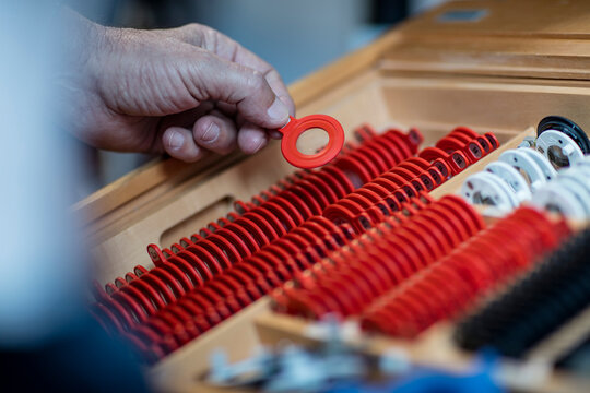 Optometrist choosing eye test lenses, close up