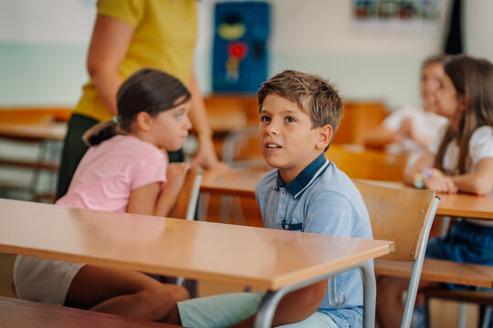 Young students learning in a school classroom