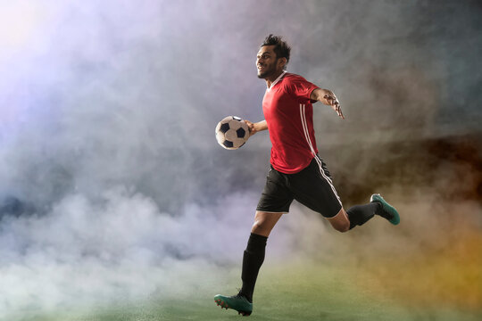 Footballer in goal celebration