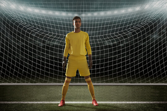 Goalkeeper standing in front of goal