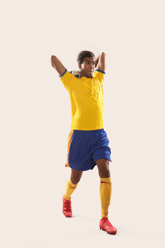 One football player goalkeeper man throwing ball �
